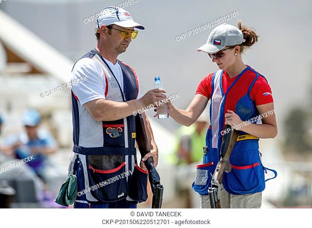 From left Jan Sychra and Libuse Jahodova from Czech Republic compete in mixed team skeet shooting semifinals at the Baku 2015 1st European Games in Baku