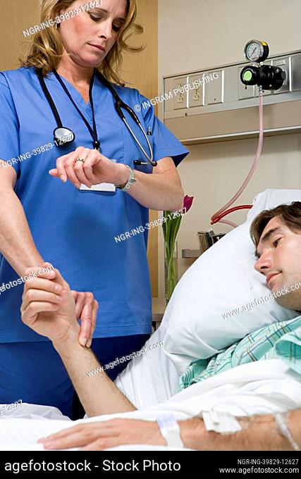 Doctor checking patients pulse