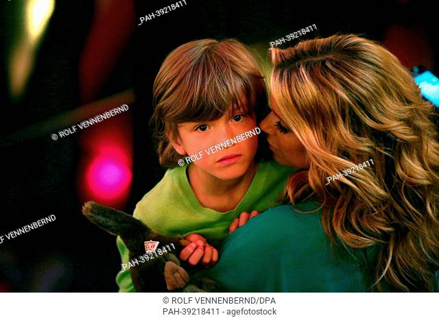 Dutch TV presenter Sylvie van der Vaart hugs her son Sohn Damian during the show 'Let's Dance' of broadcaster RTL at Coloneum in Cologne, Germany, 03 May 2013