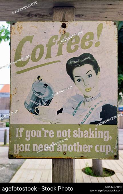 old advertising sign for coffee with picture and writing If you don't shiver, you need another cup in Montalivet les Bains, Cote d'Argent region