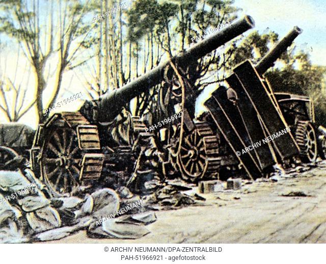 The contemporary colorized German propaganda photo shows Italian canons captured in battle after the German-Austrian breakthrough on the Isonzo Front near...