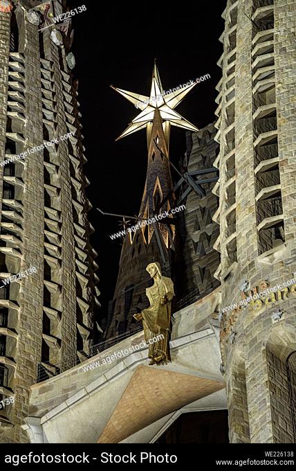 Passion Facade and the Virgin Mary tower of the Sagrada Familia at night (Barcelona, Catalonia, Spain)