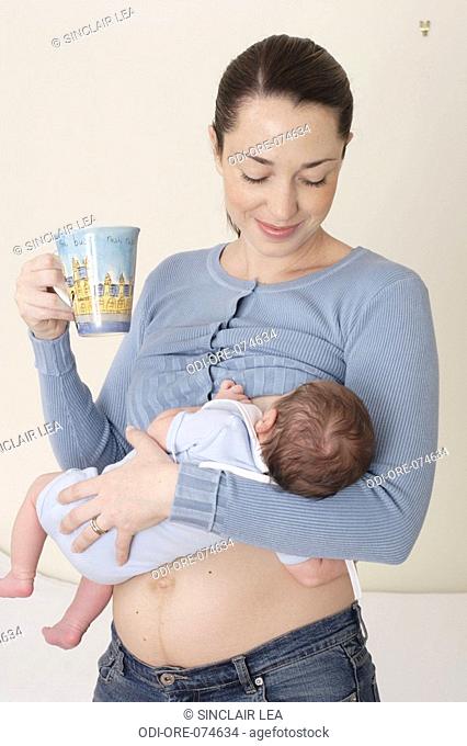 Woman breastfeeding her chid