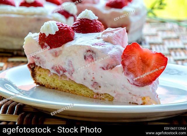 homemade fresh strawberry cake with whipped cream