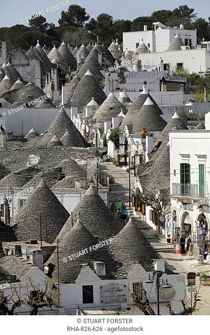 The cone-shaped roofs of trulli houses in the Rione Monte district, UNESCO World Heritage Site, Alberobello, Apulia, Italy, Europe