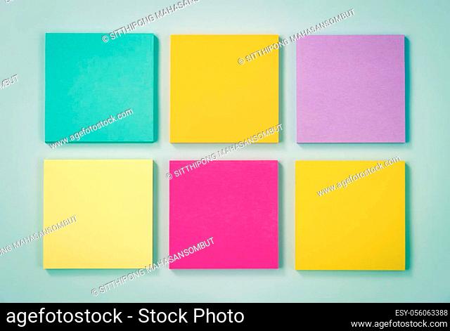 6 Color Sticky Note or Note Pad as Green, Purple, Pink, Yellow on Modern Clean Creative Office Desk or Office Table on Top View