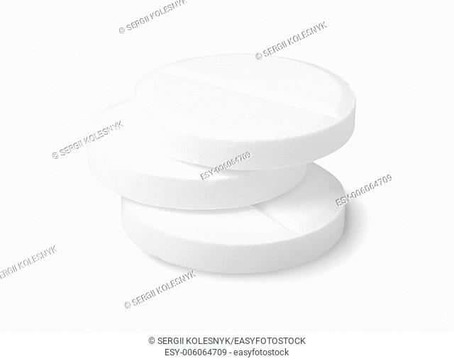 Three tablets aspirin isolated on a white background