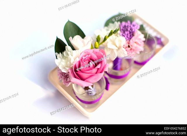 wedding bouquet of flowers pink and white rose roses on a light background
