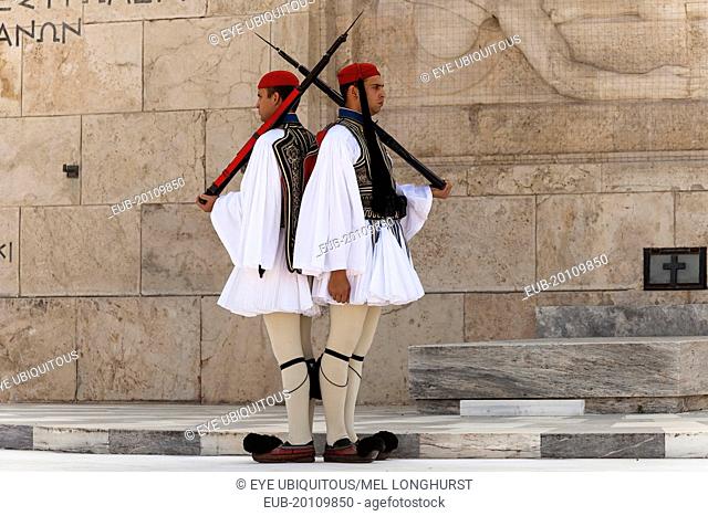 Greek soldiers, Evzones, beside Tomb of the Unknown Soldier, outside Parliament building
