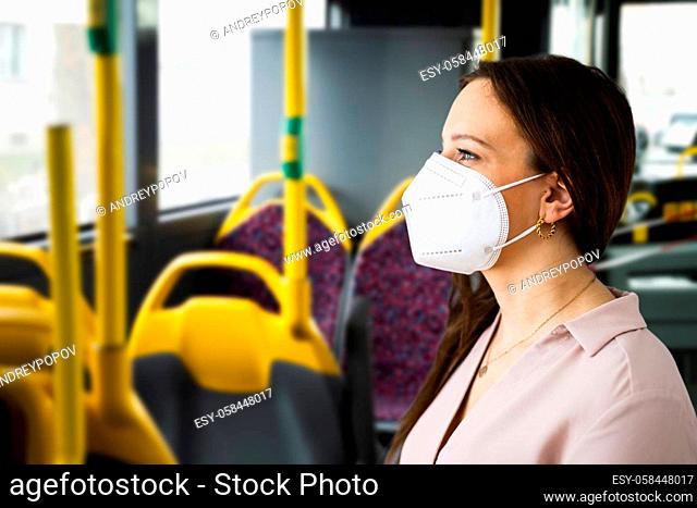 Woman In Public Bus Transport With FFP2 Face Mask