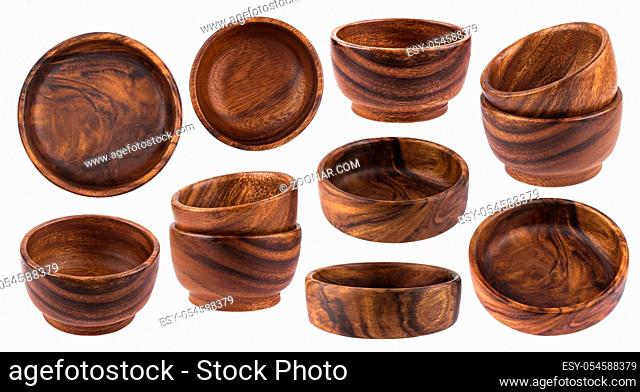 Collection of empty wooden bowls isolated on white background with clipping path