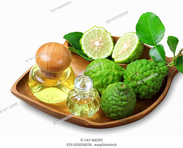 Kaffir lime or bergamot with aromatic spa of bottles essential oil isolated on white background, clipping path