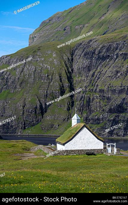 Small church with grass roof in mountain landscape, Saksun, Streymoy, Faroe Islands, Føroyar, Denmark, Europe