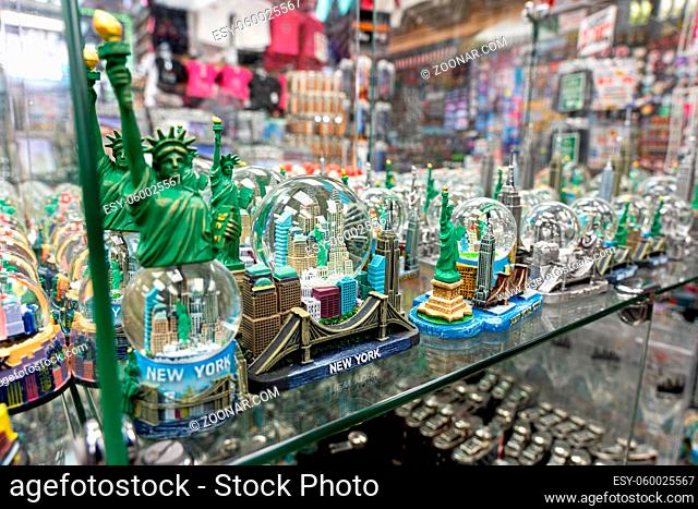 New York, United States - September 20, 2019: Collection of small statue for sale in a souvenir shop in Manhattan