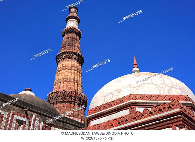 Alai Darwaza , Imam Zamins tomb and Qutab Minar built in 1311 red sandstone tower , Delhi , India UNESCO World Heritage Site
