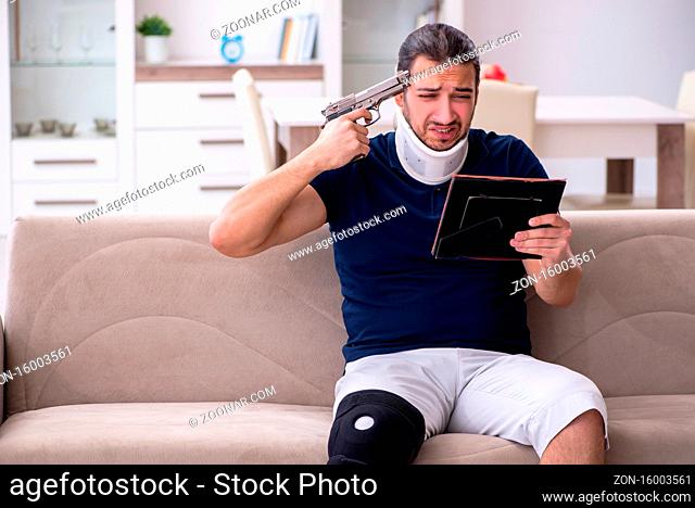 Young injured man in the unrequited love concept