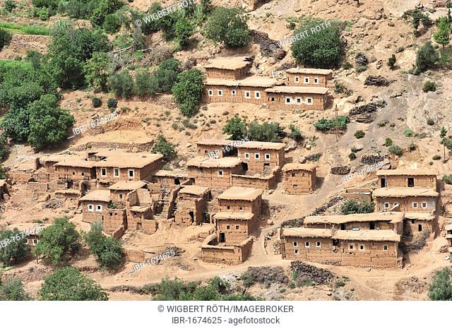 Typical Berber village with traditional adobe houses and small kasbahs in the mountains of the High Atlas, Morocco, Africa