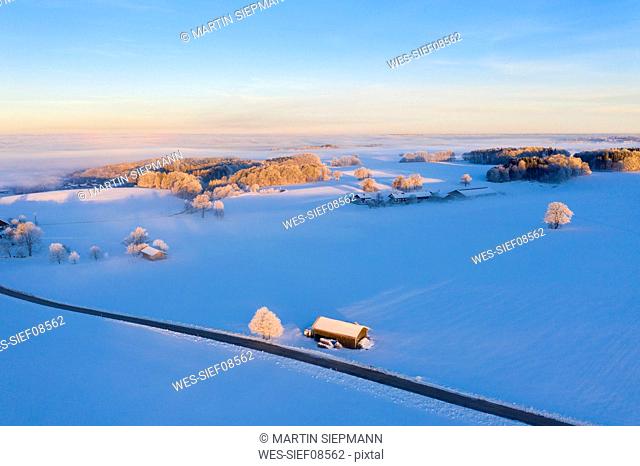 Germany, Bavaria, near MÇ¬nsing, winter landscape at sunrise, aerial view