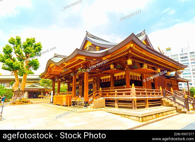 Tokyo, Japan - July 30, 2015: Front entrance to Yushima Tenmangu Shinto Shrine on a bright sunny, summer day