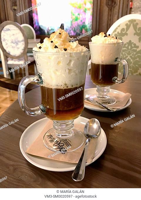 Two glasses of Irish coffee in a cafe