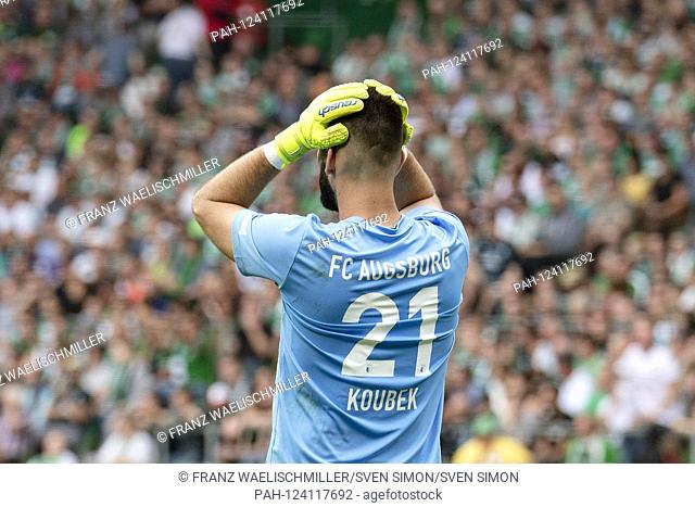 Goalkeeper Tomas KOUBEK (A) grips his head with both hands; photographed from behind; Disbelief, despair; Soccer 1. Bundesliga, 3