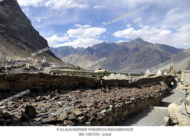 Mani (prayer inscribed) stones with Mantras on a Mani wall in the Hundar oasis, Nubra Valley, Ladakh, Jammu and Kashmir, North India, India, Asia