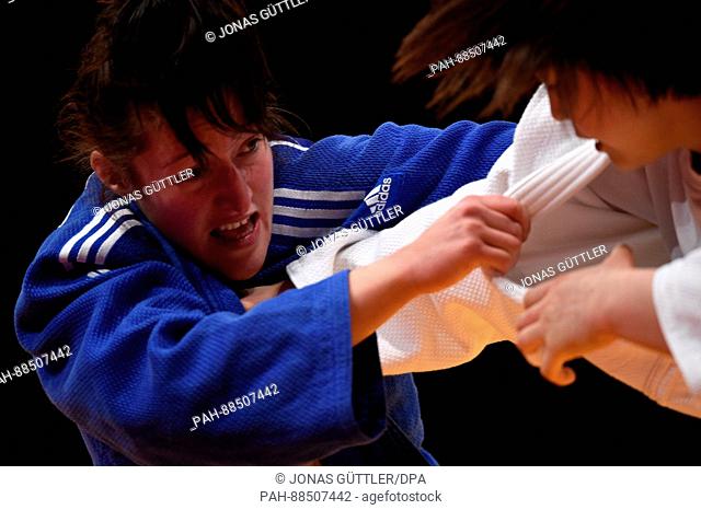Rika Takayama (white, Japan) and Natalie Powell (blue, Great Britain) in action in the women's above 78 kg body weight competition at the Judo Grand Prix in the...