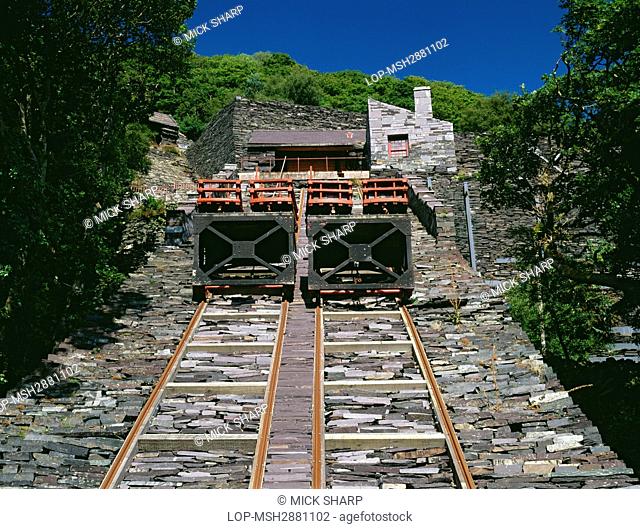 Wales, Gwynedd, Llanberis. Slate wagons, rails, cables and roller house on the restored V2 Incline of the Vivian Quarry. Finished slates were moved on inclined...