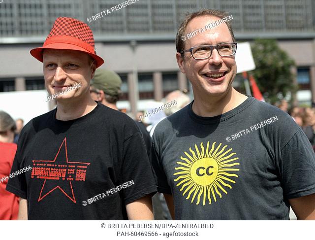 Markus Beckedahl (r), founder of the website Netzpolitik.org, and a writer from the website, Andre Meister (l) attend a demonstration to support the internet...