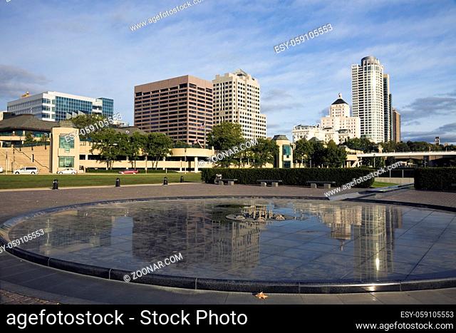 Downtown Milwaukee reflected in fountain