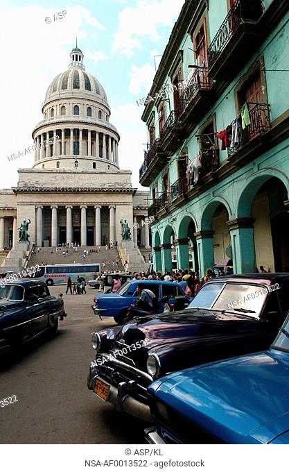 Front view of vintage cars parked outside a building, Havana, Cuba