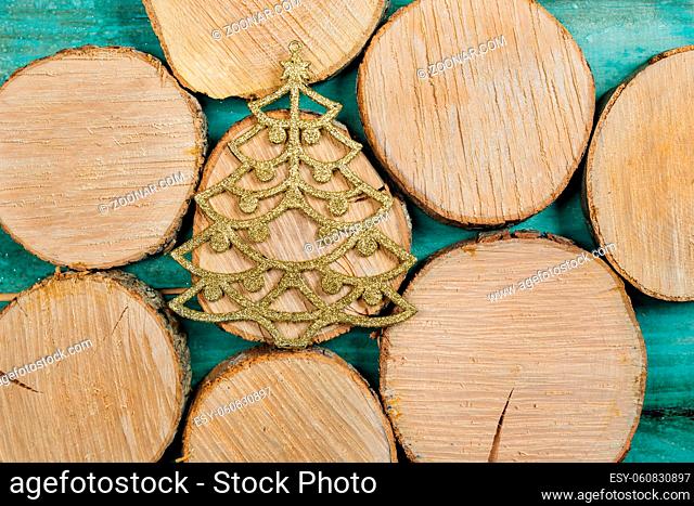 Colourful traditional Christmas decoration on grunge wood texture of old weathered boards with copyspace