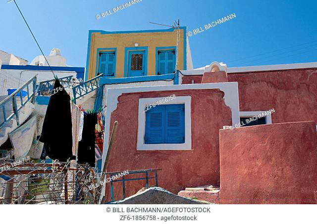 Colorful homes in isolated village of Thirassia across from Santorini Greece in Greek Islands