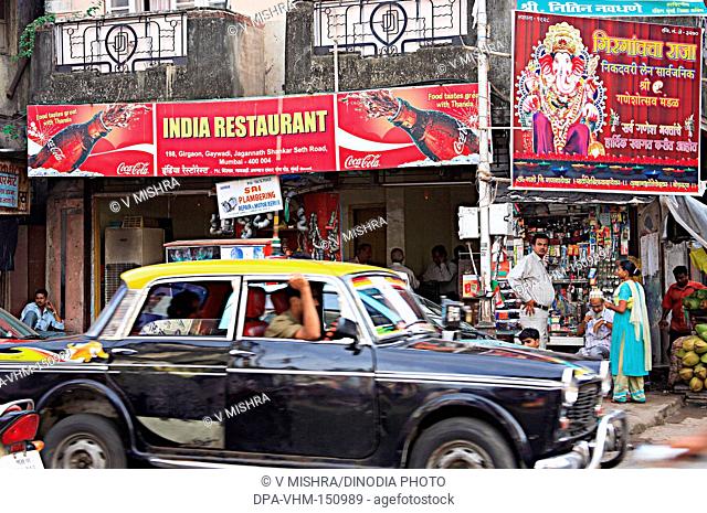 Old building chawl gaywadi mass urban housing and festival ganesh chaturthi hording ; Charni road ; Bombay Mumbai ; Maharashtra ; India
