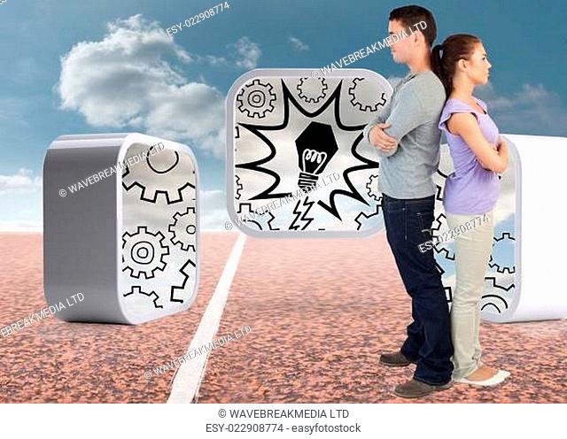 Composite image of young couple standing back to back