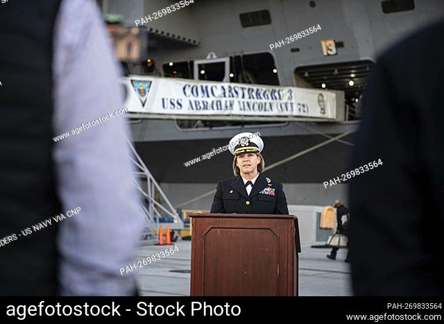 Captain Amy Bauernschmidt, commanding officer of Nimitz-class aircraft carrier USS Abraham Lincoln (CVN 72), speaks with local media during a press conference...