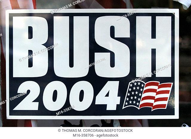 2004 presidential campaign: a Bush 2004 poster hangs in the window of a Washington DC business