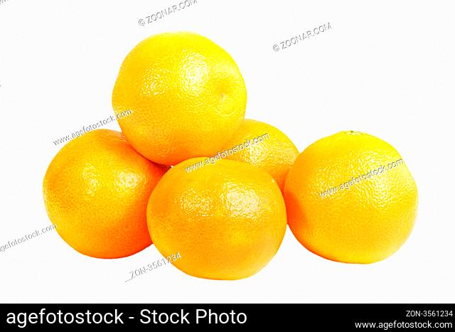 Stack of mandarines placed on the white background