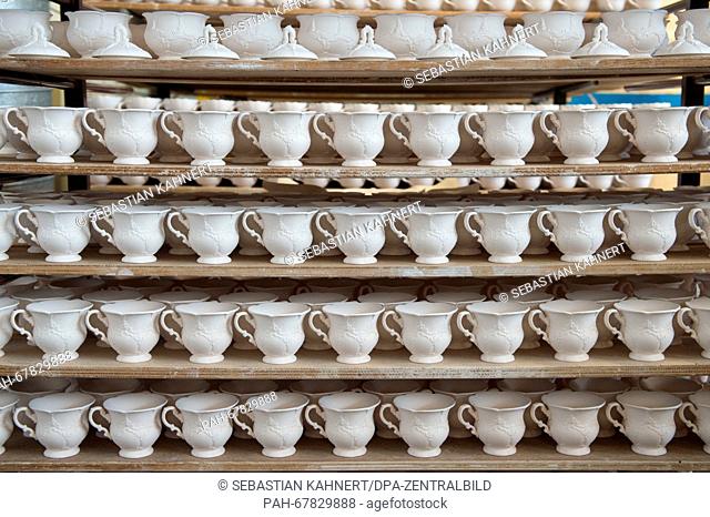 Unvarnished cups and bowls made from Meissen porcelain pictured in the production facility of porcelain manufacturer Meissen in Meissen,  Germany, 27 April 2016
