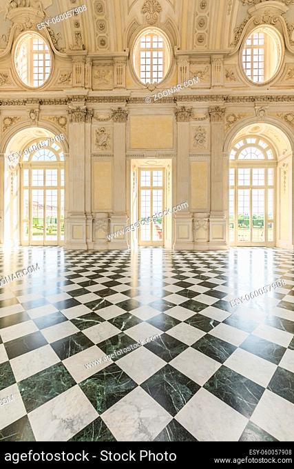 VENARIA REALE, ITALY - CIRCA MAY 2021: corridor with floor made of luxury marbles. Plenty of elegance for this Italian interior in Venaria Reale