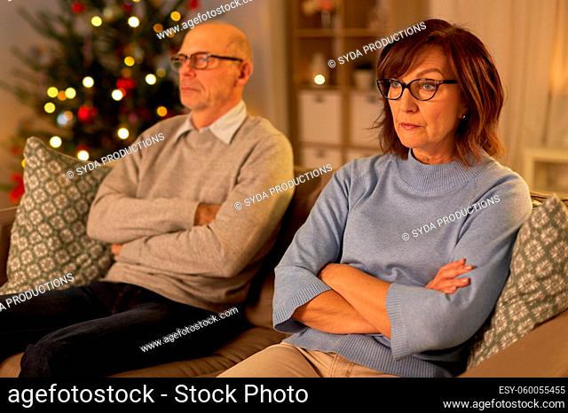 unhappy senior couple at home on christmas