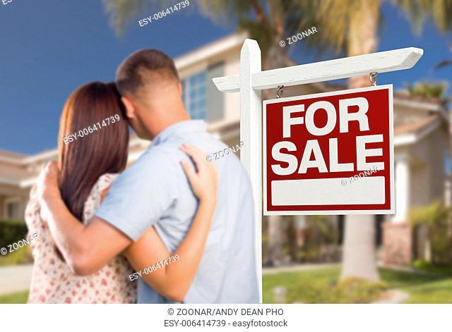 For Sale Real Estate Sign, Military Couple Looking at House