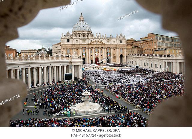 Believers fill St. Peter's Square during the historic double canonization ceremony for past pontiffs Pope John Paul II and Pope John XXIII in an open air mass...