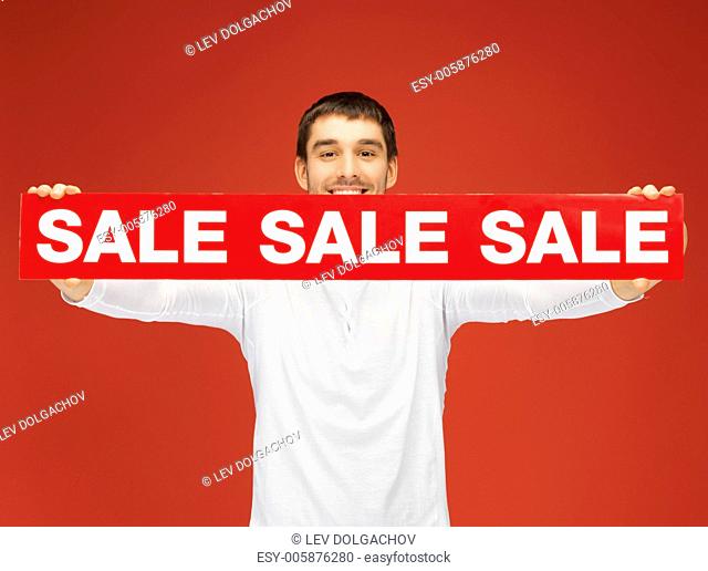 bright picture of handsome man with sale sign