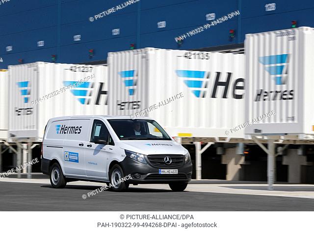 20 March 2019, Saxony-Anhalt, Kabelsketal: A new electric eVito from Mercedes drives across the grounds of the new Hermes Logistics Centre