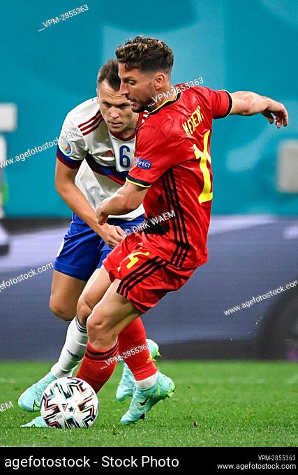 Belgium's Dries Mertens and Russian Denis Cheryshev fight for the ball during a soccer game between Russia and Belgium's Red Devils