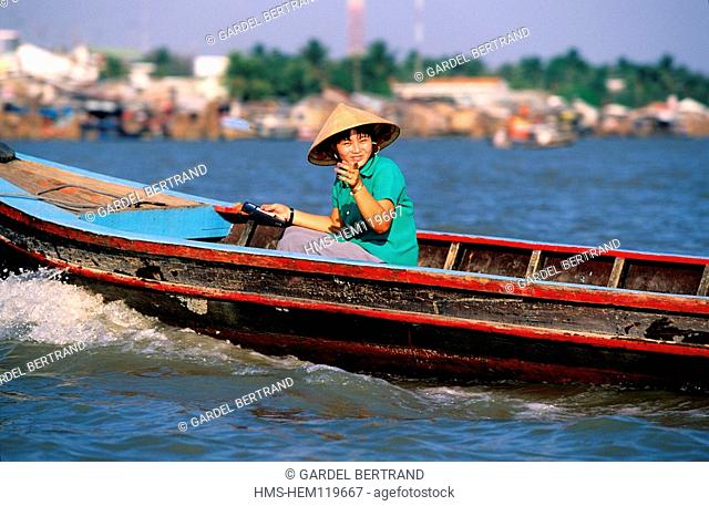 Vietnam, Delta of Mekong river, transport in boat on the channels of the town of Mytho