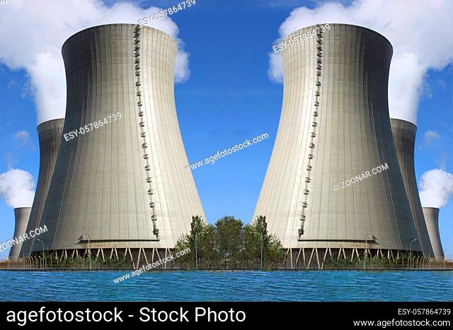 photo of a nuclear power plant chimneys active