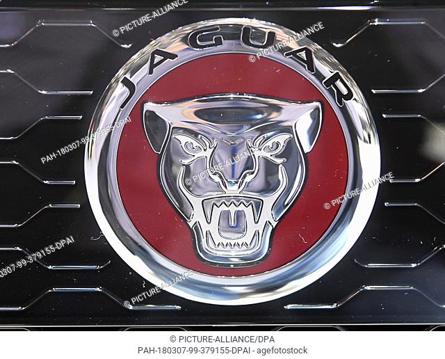 07 March 2018, Switzerland, Geneva: The logo of carmaker Jaguar is displayed during the 2nd Press Day at the 2018 Geneva Motor Show