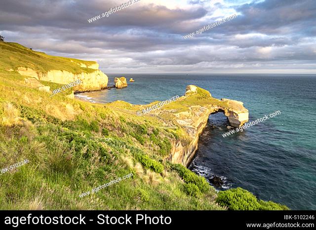 Rocky cliffs at Tunnel Beach, Dunedin, Otago, South Island, New Zealand, Oceania